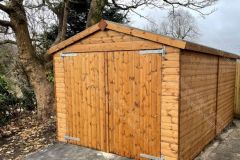 14x10-Tongue-And-Groove-Jumbo-Delux-Apex-Shed-with-large-double-doors-for-vehicle-access-treated-rustic-brown555
