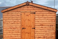 Log-Lap-Apex-Shed-with-single-door-treated-red-cedar-335