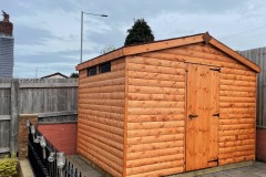 Log-Lap-Apex-Shed-with-single-door-treated-red-cedar-88